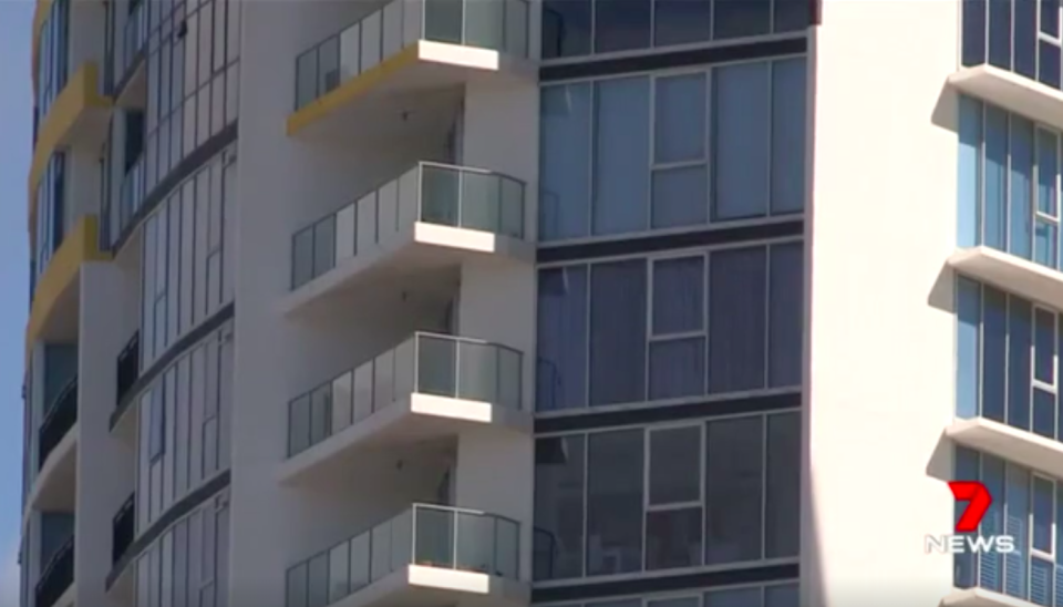 The 25-year-old was moments from falling from the Southport Central building. Source: 7 News