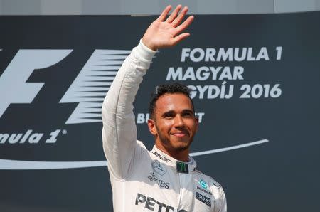 Hungary Formula One - F1 - Hungarian Grand Prix 2016 - Hungaroring, Hungary - 24/7/16 Mercedes' Lewis Hamilton celebrates after winning the race REUTERS/Laszlo Balogh