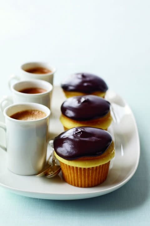 <p>This miniature version of the classic custard pie leaves nothing out, with rich vanilla pudding, buttermilk and a semisweet chocolate glaze.</p><p><strong><a href="https://www.womansday.com/food-recipes/food-drinks/recipes/a11127/boston-cream-cupcakes-recipe-122598/" rel="nofollow noopener" target="_blank" data-ylk="slk:Get the recipe.;elm:context_link;itc:0;sec:content-canvas" class="link ">Get the recipe.</a></strong></p>