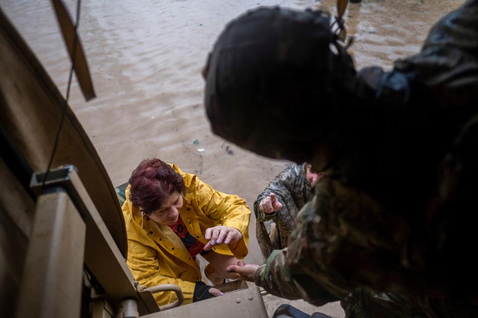 The National Guard rescues a woman in Salinas, Puerto Rico after Hurricane Fiona (REUTERS)