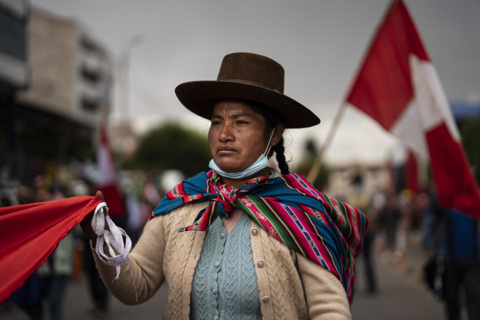 FILE - An Aymara woman takes part in an anti-government protester in Cusco, Peru, Feb. 2, 2023. Protesters are seeking immediate elections, the resignation of President Dina Boluarte and the dissolution of Congress, since former President Pedro Castillo was ousted and arrested for trying to dissolve Congress in December. (AP Photo/Rodrigo Abd, File)