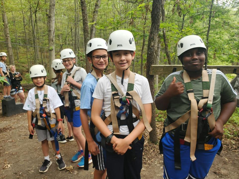 Yunasa campers getting ready to zipline.