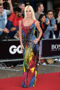 <p><strong>Wearing:</strong> A colourful, form-fitting Versace gown. <br>[Photo: Getty] </p>