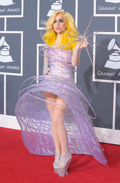 Ombre hair was a huge trend in 2010 - but Gaga took it to the next level with platinum blending into cartoon yellow. The bubblegum pink lips added to the candy sweet look.