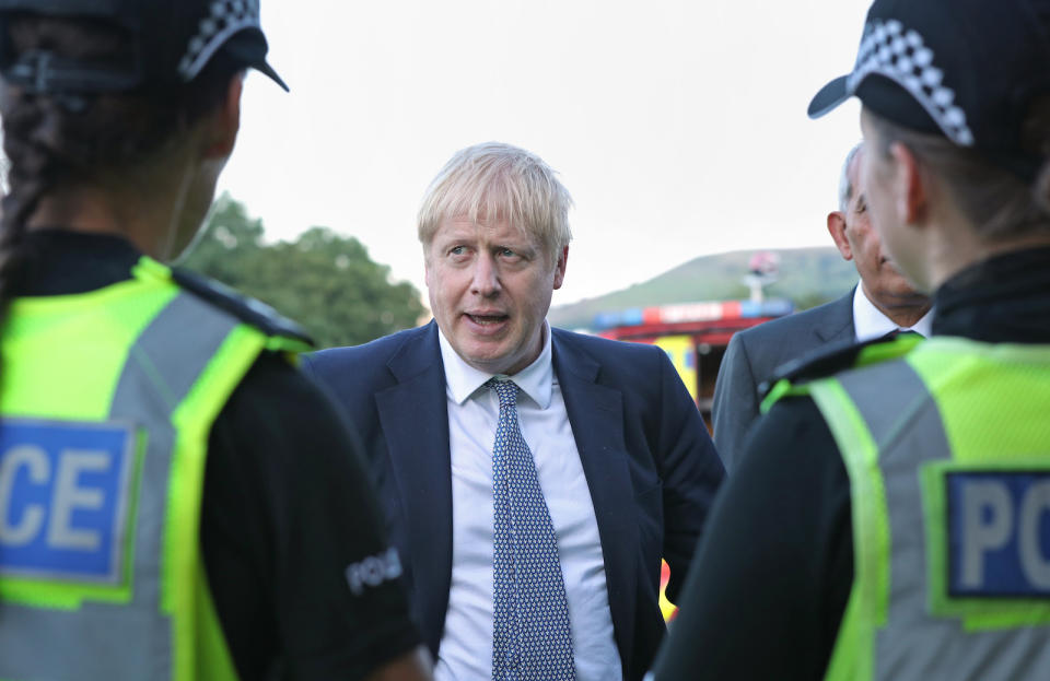 Prime minister Boris Johnson meeting police (Picture: PA)