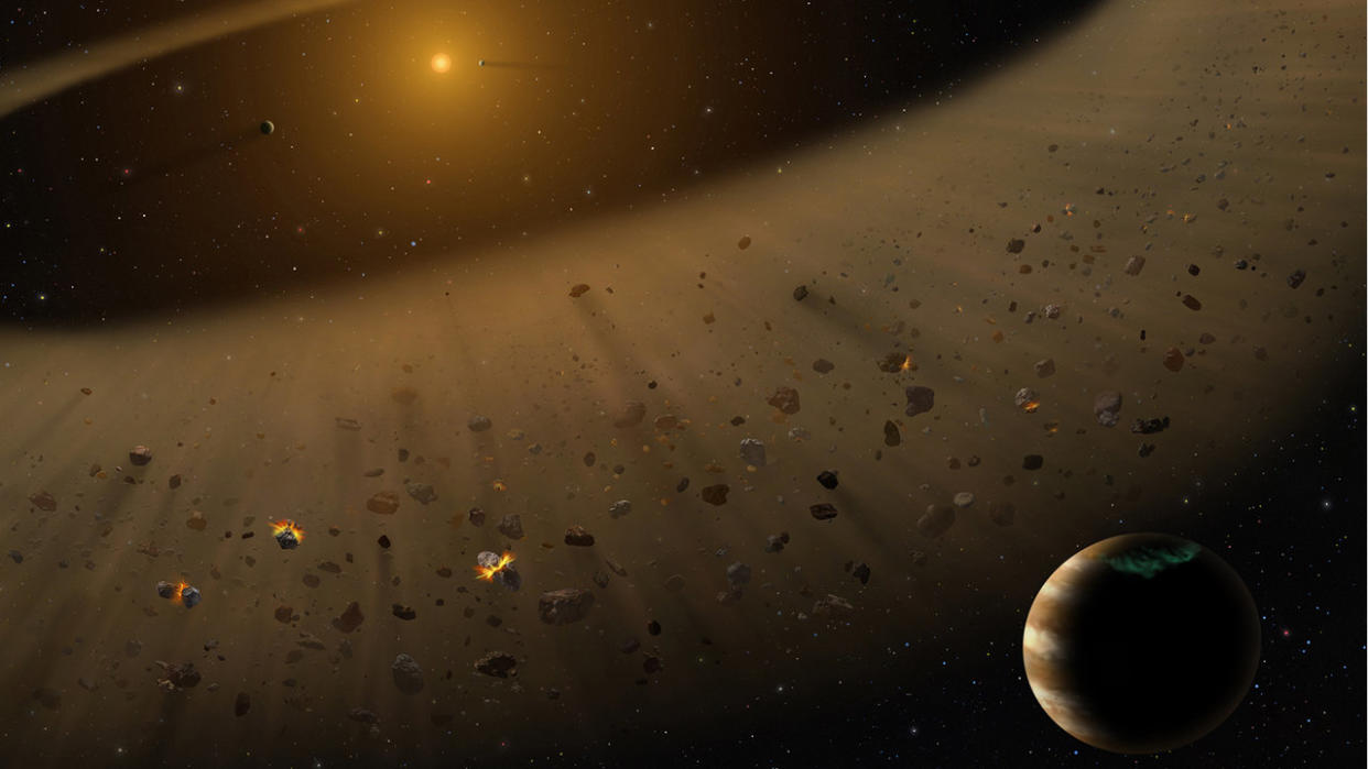  An illustration of the Kuiper belt with brownish hues. In the foreground, a hypothetical 'Planet 9' is seen. 