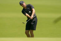 Jordan Spieth chips to the green on the second hole during a practice round for the PGA Championship golf tournament, Wednesday, May 18, 2022, in Tulsa, Okla. (AP Photo/Matt York)