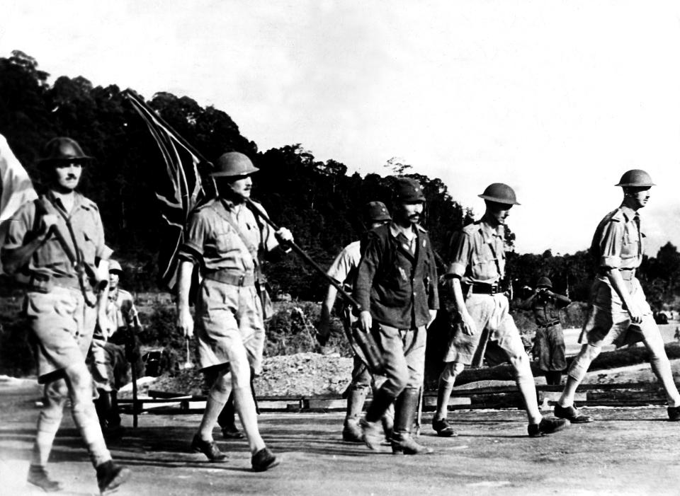 Lieutenant-General Arthur Percival (right) Commander of the British Commonwealth forces walking with his fellow officers to surrender unconditionally to Japanese forces in Singapore on 15 February 1942. (PHOTO: Ullstein Bild via Getty Images)