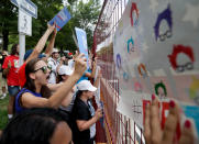 <p>Supporters of Sen. Bernie Sanders yell at delegates through the fence at Franklin Delano Roosevelt Park in Philadelphia, Tuesday, July 26, 2016, during the second day of the Democratic National Convention. (Photo: Matt Slocum/AP)</p>
