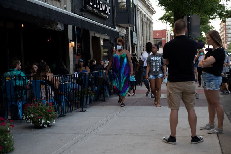 People go out to eat at crowded restaurants in Royal Oak, Michigan