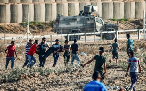 Two Palestinian teenagers and 46 other protesters were wounded during weekly demonstrations along the Gaza border on Friday