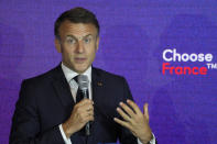 French President Emmanuel Macron speaks at the French Microsoft headquarters in Issy-les-Moulineaux, outside Paris, Monday, May 13, 2024. Microsoft, which has been present in France for 41 years, is announcing a 4 billion euro investment this year, the largest to date in the country, to support French growth in the new artificial intelligence economy. (AP Photo/Thibault Camus, Pool)