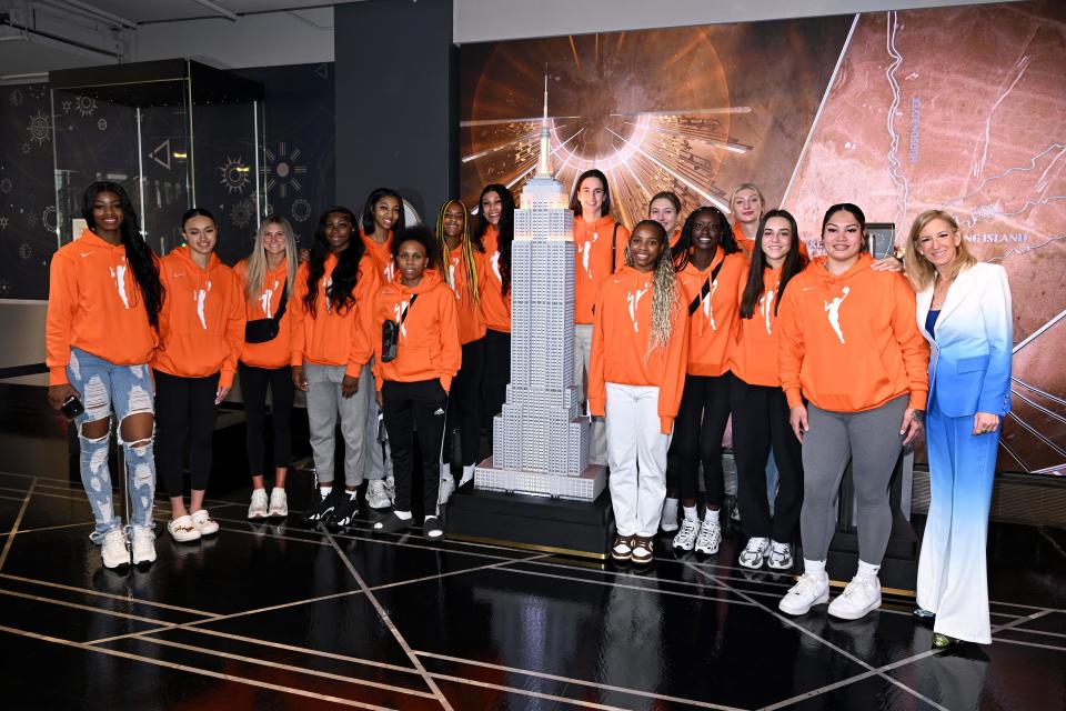 WNBA commissioner Cathy Engelbert and the invited prospects to the 2024 WNBA draft visit The Empire State Building in New York City on Monday.