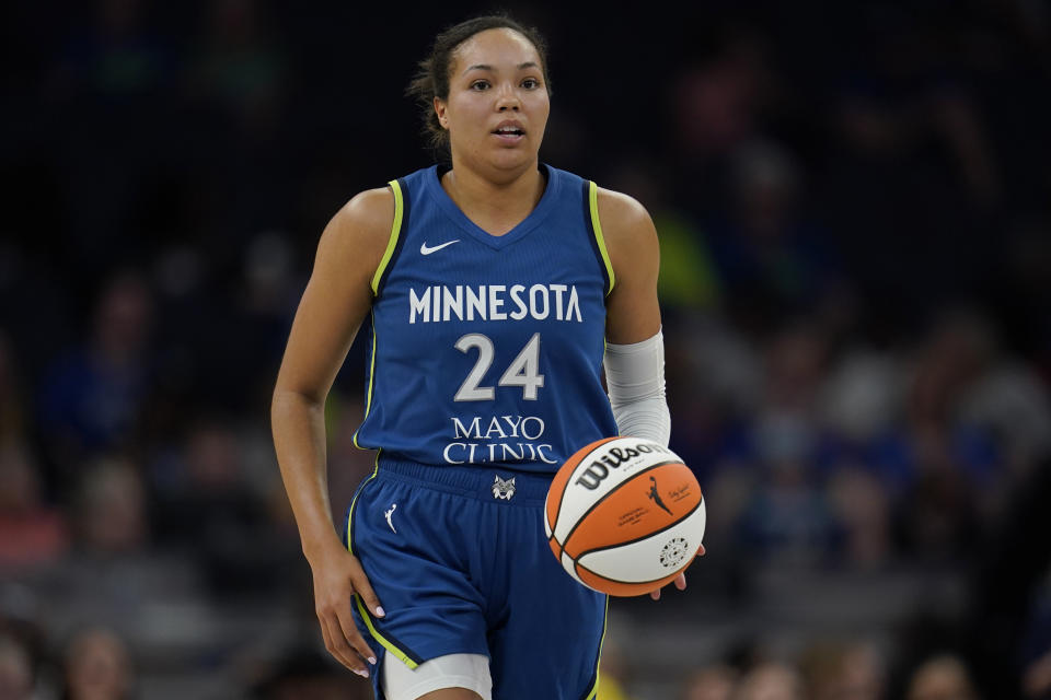 Minnesota Lynx forward Napheesa Collier dribbles downcourt during the second half of a WNBA basketball game against the Indiana Fever, Friday, June 9, 2023, in Minneapolis. (AP Photo/Abbie Parr)