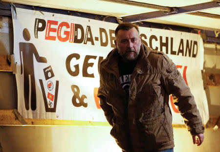 FILE PHOTO: Lutz Bachmann, leader of the anti-immigration rightwing movement PEGIDA (Patriotic Europeans Against the Islamisation of the West) arrives for their weekly gathering in Dresden, Germany October 26, 2015. REUTERS/Fabrizio Bensch/File Photo