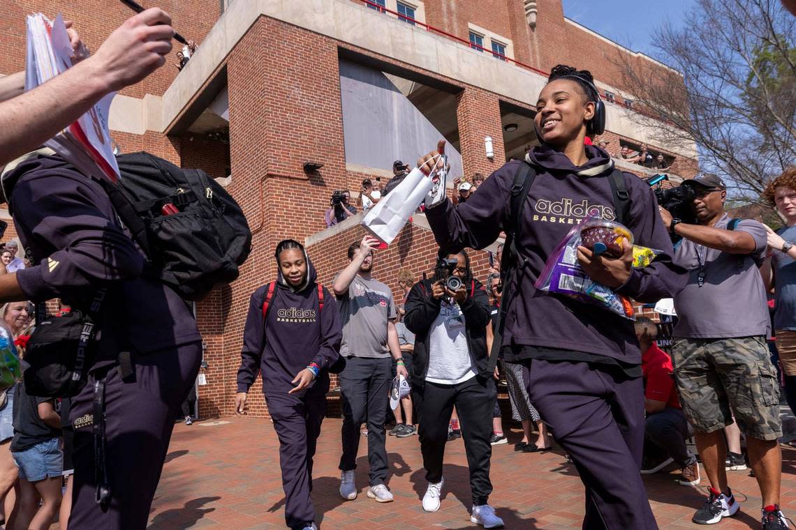 NC State’s Aziaha James is greeted by fans on Tuesday, April 2, 2024 while boarding a bus outside Reynolds Coliseum bound for the Final Four game on Friday.