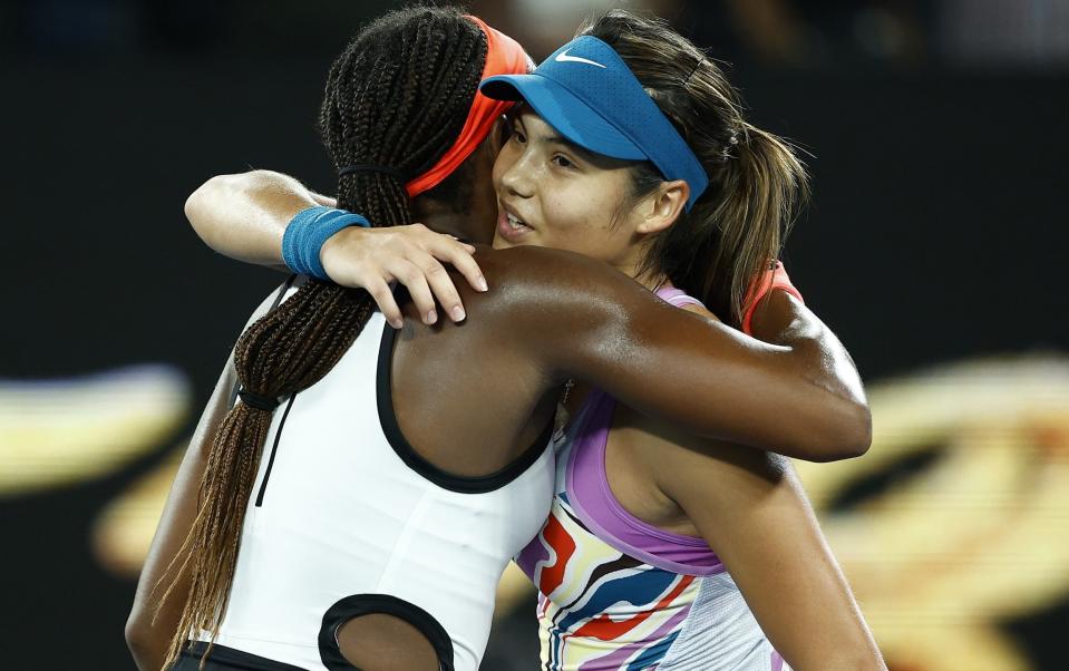 Coco Gauff (L) of the United States embraces Emma Raducanu of Great Britain after winning their round two singles match during day three of the 2023 Australian Open - Daniel Pockett/Getty Images