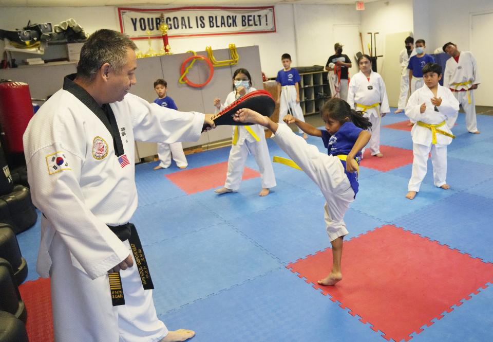 Sergio Camacho works with kids at his martial arts institute, Master Camacho Martial Arts. The Mexican immigrant has been teaching kids how to defend themselves at his Maryvale school for more than 20 years.