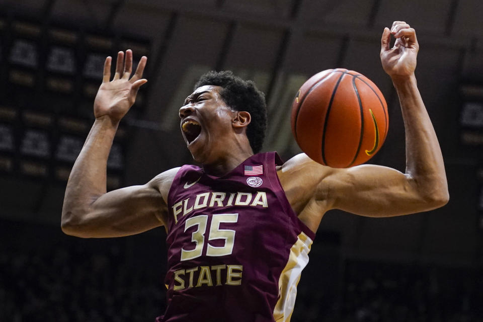 Florida State guard Matthew Cleveland (35) reacts after a dunk against Purdue during the first half of an NCAA college basketball game in West Lafayette, Ind., Tuesday, Nov. 30, 2021. (AP Photo/Michael Conroy)