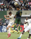 Portland Timbers forward Felipe Mora (9) heads the ball against Los Angeles FC during an MLS soccer match Sunday, Sept. 19, 2021, in Portland, Ore. (Sean Meagher/The Oregonian via AP)