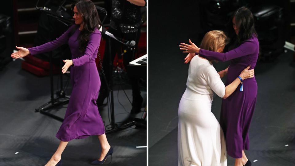 Meghan Markle hugging someone on stage