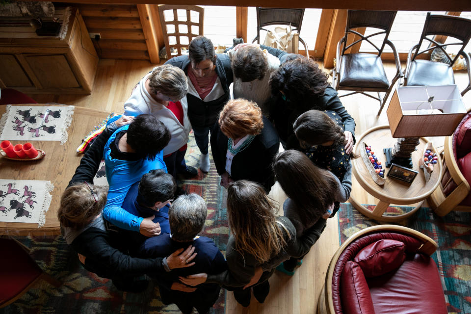 Women who met with Heitkamp at a home on the reservation of the Turtle Mountain Band of Chippewa Indians surrounded her to offer a blessing. (Photo: Ilana Panich-Linsman for HuffPost)