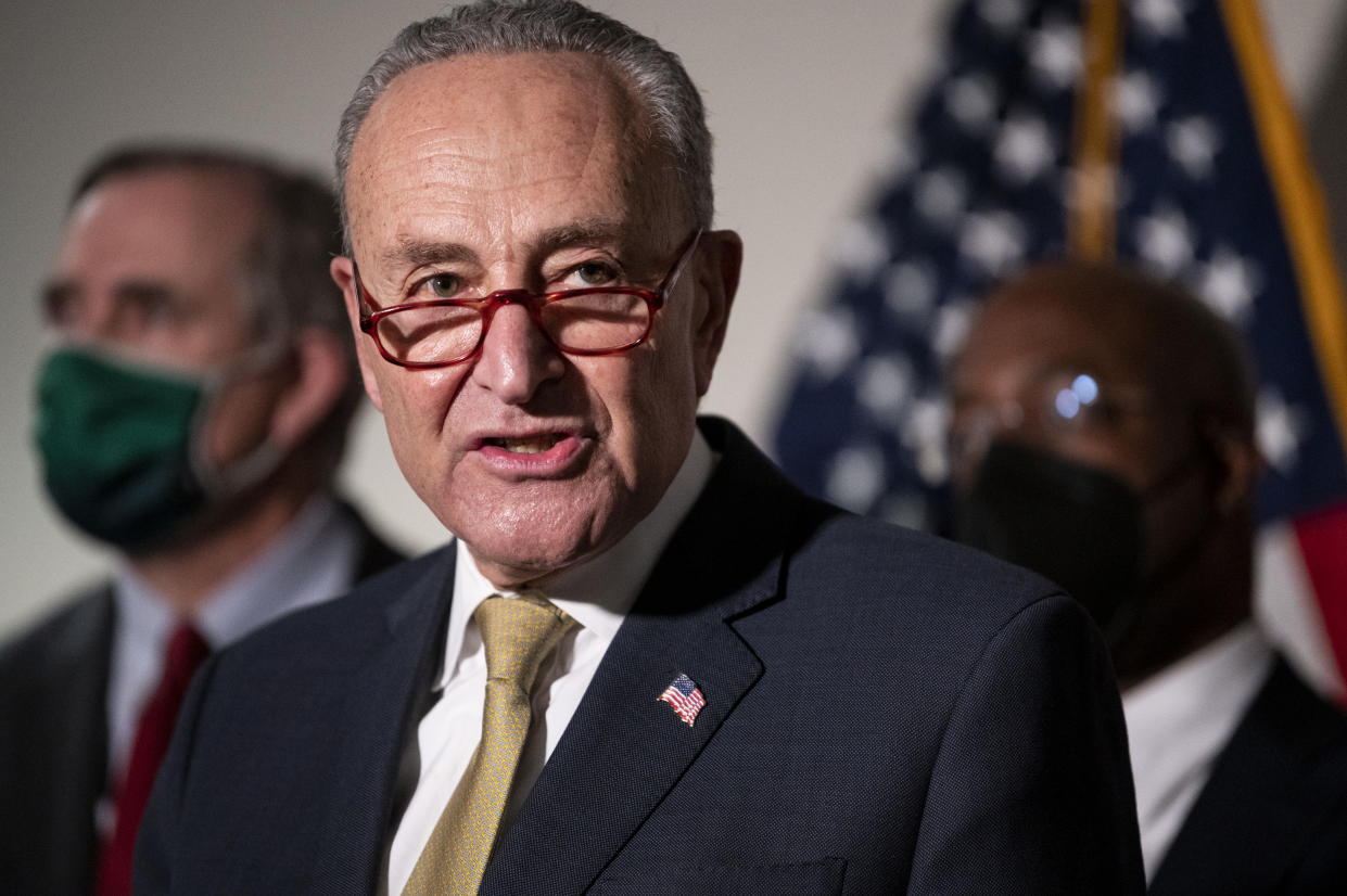 Senate Majority Leader Chuck Schumer, D-N.Y., holds his new conference following the Senate Democrats' caucus meeting on voting rights and the filibuster on Jan. 18.