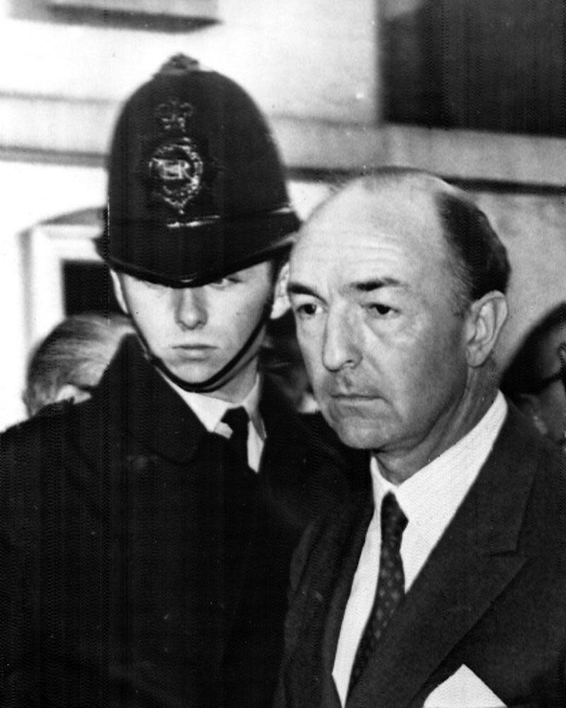 John Profumo and a police officer