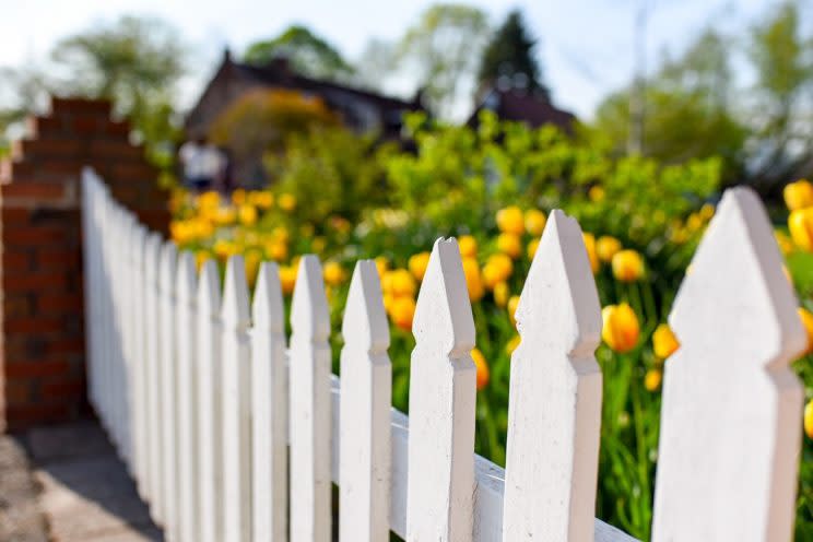 [A white-picket fence and a garden is a dream for many first-time homebuyers, but it comes with a high price tag.]