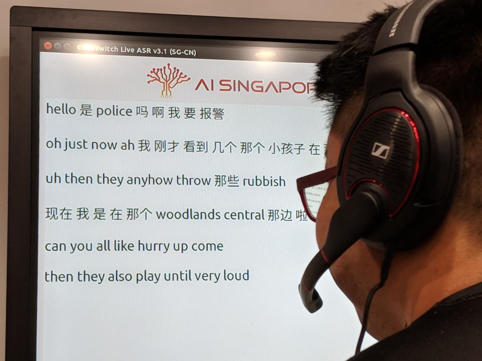A live demonstration of the code-switch speech recognition system developed by AI Singapore on 9 July, 2018. (PHOTO: Wong Casandra/Yahoo News Singapore)