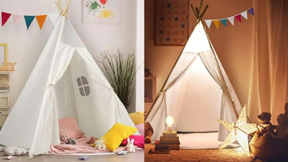 A beautiful teepee that comes with a hanging LED light and a floor mat.