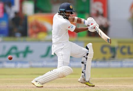 Cricket - Sri Lanka v India - First Test Match - Galle, Sri Lanka - July 28, 2017 - Sri Lanka's Dilruwan Perera plays a shot. REUTERS/Dinuka Liyanawatte