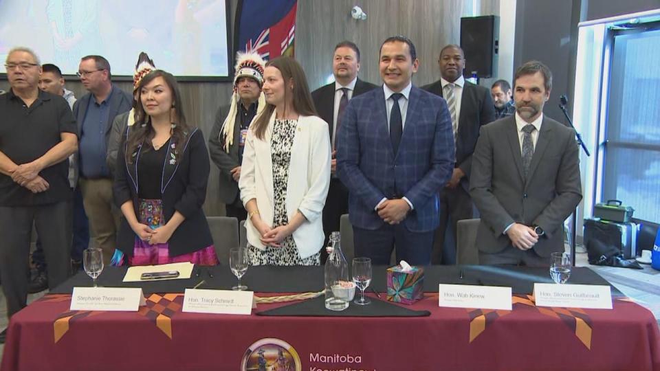 Seal River Watershed Alliance executive director Stephanie Thorassie, left, provincial Environment Minister Tracy Schmidt, beside her, Premier Wab Kinew, and federal Environment Minister Steven Guilbeault, right, attend the signing.