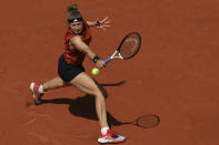 Karolina Muchova of the Czech Republic plays a shot against Russia's Anastasia Pavlyuchenkova during their quarter final match of the French Open tennis tournament at the Roland Garros stadium in Paris, Tuesday, June 6, 2023. (AP Photo/Aurelien Morissard)