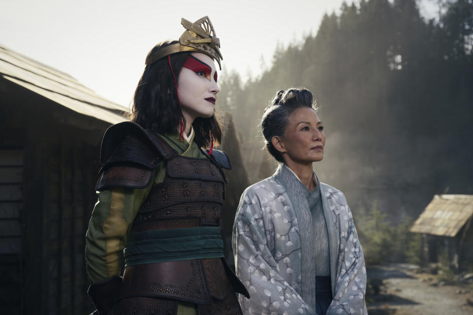 This image released by Netflix shows Maria Zhang, left, and Tamlyn Tomita in a scene from the series "Avatar: The Last Airbender." (Robert Falconer/Netflix via AP)