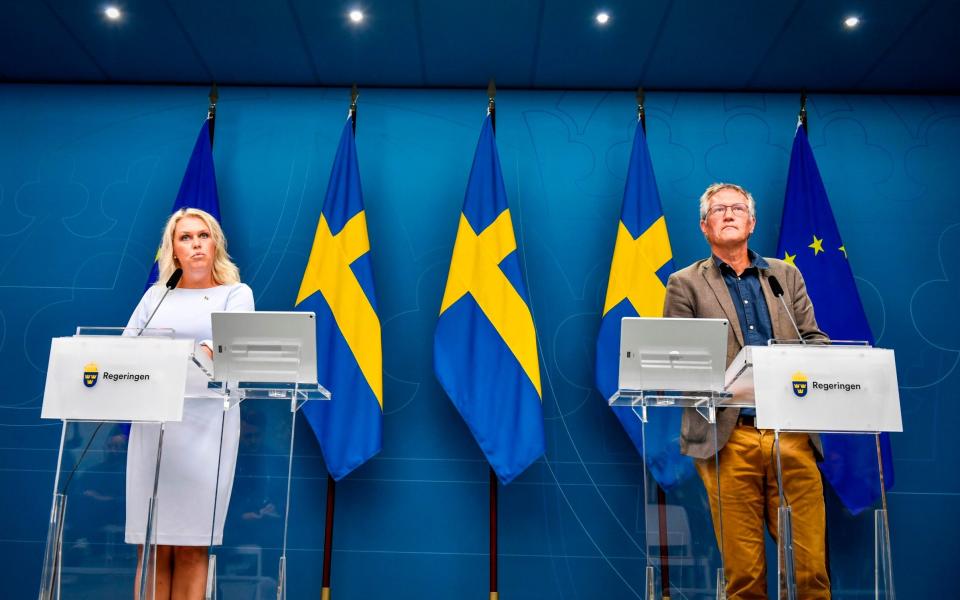 Anders gives a press briefing during the pandemic with Lena Hallengren, Sweden's then minister for health and social affairs - NAINA HELEN JAMA/TT NEWS AGENCY/AFP via Getty Images