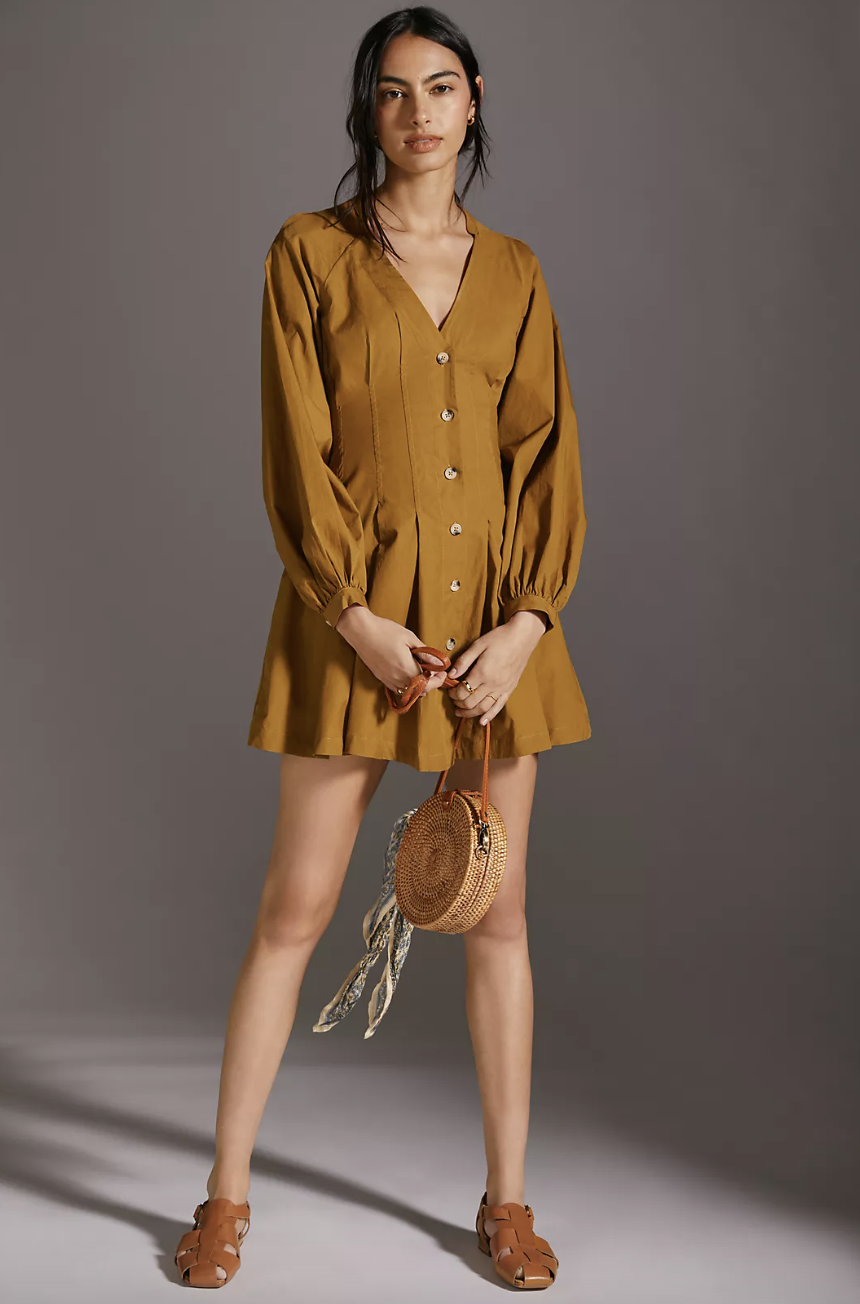 brunette model in brown Puff-Sleeved Mini Shirtdress (Photo via Anthropologie)