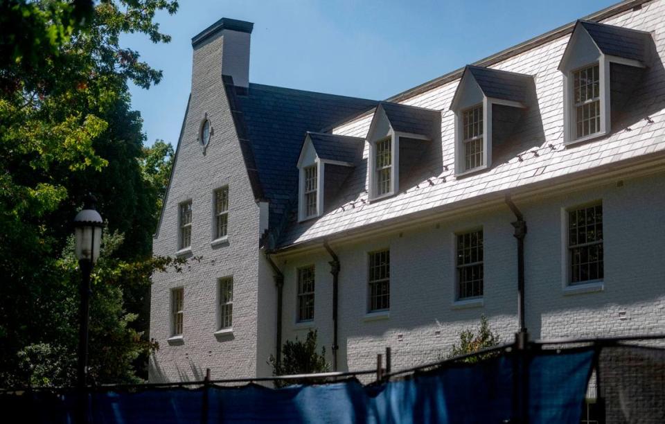 Construction fences are placed around the Nittany Lion Inn Monday as renovations continue.