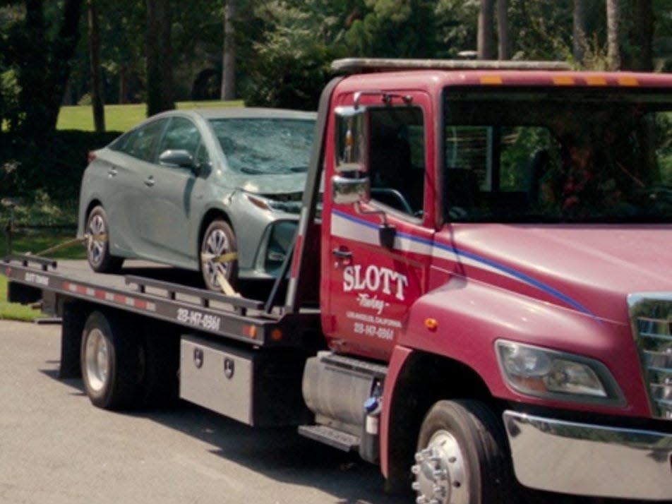 Slott Towing truck.