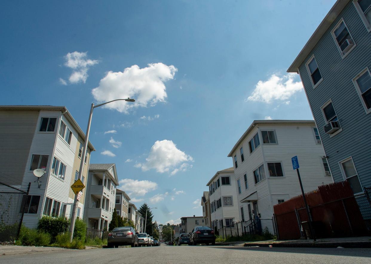 Sigel Street in the Green Island neighborhood has almost no mature tree cover for shade Thursday, August 26, 2021.