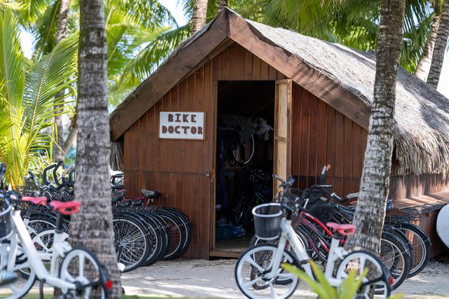 <p>John Kincaid/Courtesy of The St. Regis Bora Bora</p> Guests can bring their bikes to the “Bike Doctor” bungalow for maintenance at The St. Regis Bora Bora.