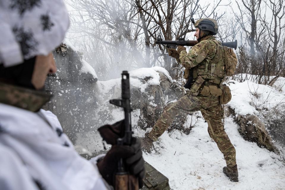 Bohdan, “Fritz”, the deputy of commander of the unit in 79th Air Assault Brigade, fires an RPG towards Russian positions on a frontline near the town of Marinka, Donetsk (Reuters)