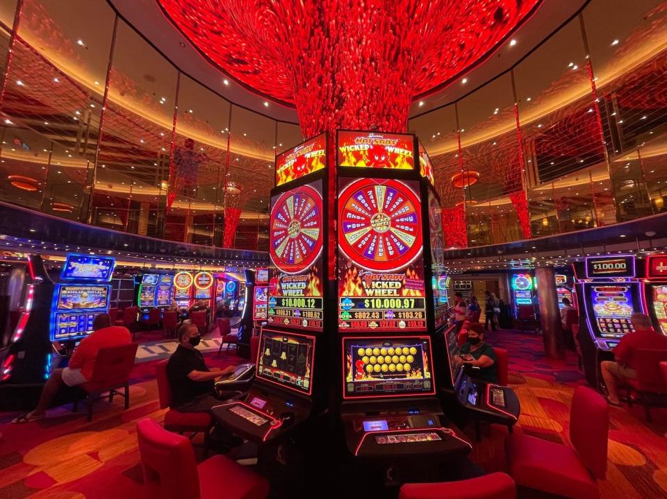 An image of slot machines on a cruise ship's casino.