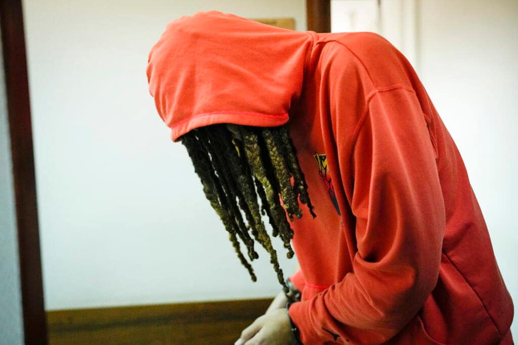 WNBA star and two-time Olympic gold medalist Brittney Griner leaves a courtroom after a hearing, in Khimki just outside Moscow, Russia, Friday, May 13, 2022. (AP Photo/Alexander Zemlianichenko)
