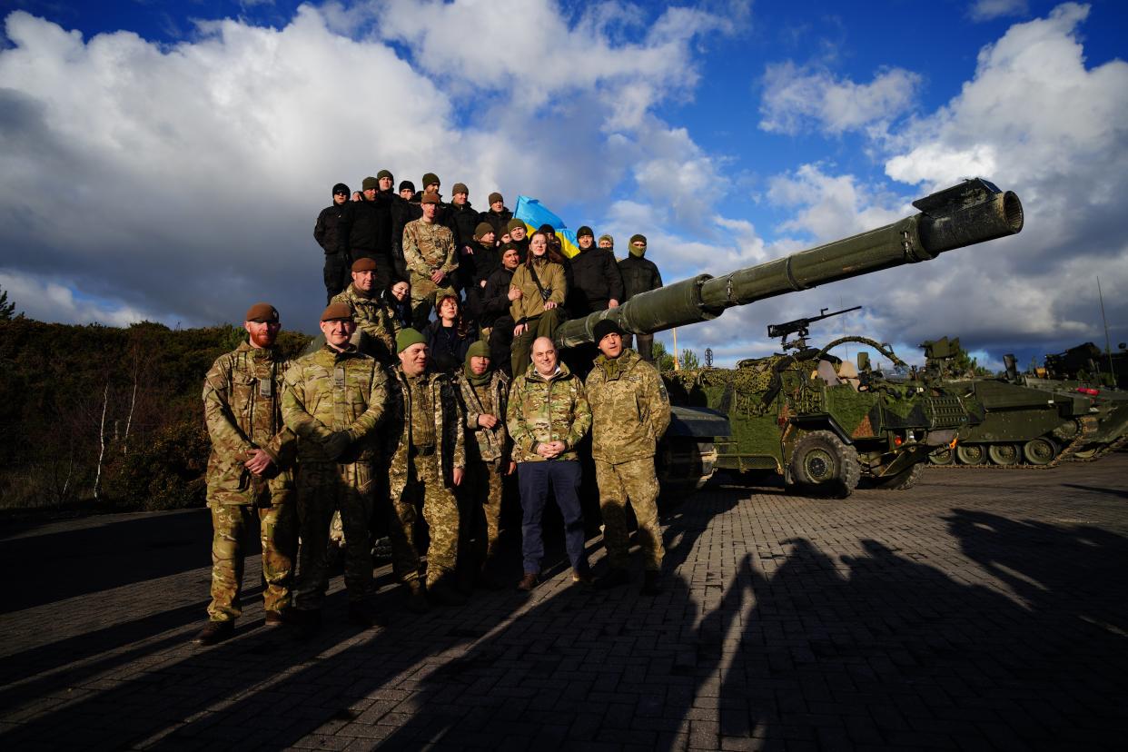 Defence secretary Ben Wallace (centre Right) with Ukrainian soldiers and interpreters during a visit to Bovington Camp, a British Army military base in Dorset, to view Ukrainian soldiers training on Challenger 2 tanks in Bovington, Dorset (Getty Images)