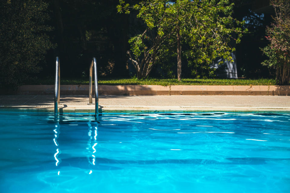 Private Swimming Pool with a garden in a chalet at a Lebanese Mountain Village in a sunny summer day