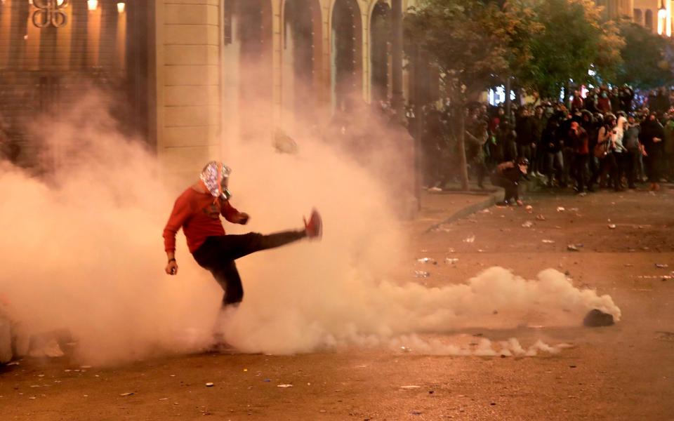 Demonstrators clashed with police during anti-government protests in December 2019 - ANWAR AMRO/AFP via Getty Images