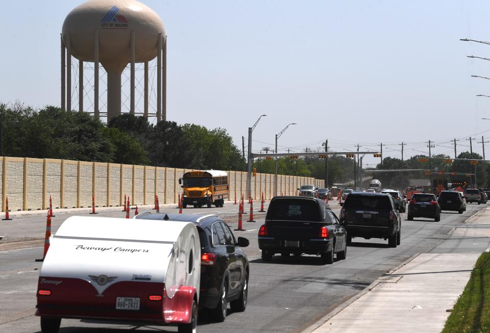 Vehicles drive on both sides of Buffalo Gap Road near the Mall of Abilene Thursday. The Texas Department of Transportation opened traffic earlier in the day though construction south of Rebecca Lane still continues.