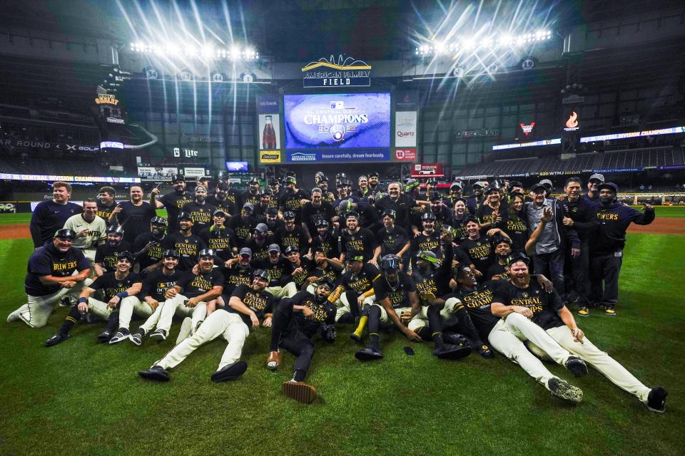 Milwaukee Brewers' pose for a picture after clinching the National League Central Division after a baseball game against the St. Louis Cardinals Tuesday, Sept. 26, 2023, in Milwaukee. (AP Photo/Morry Gash)