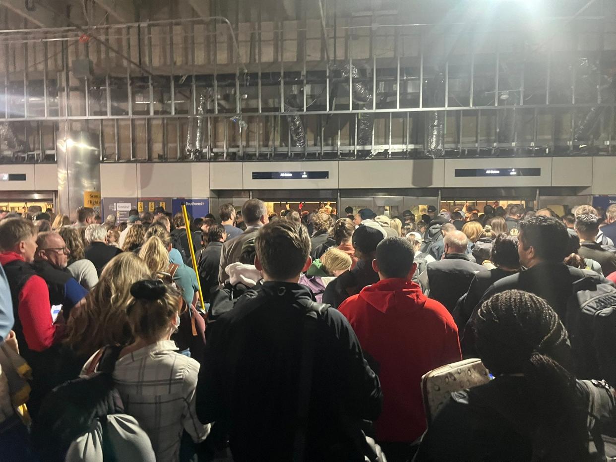 It felt like "thousands of people" waiting to board the DEN trains on Tuesday.